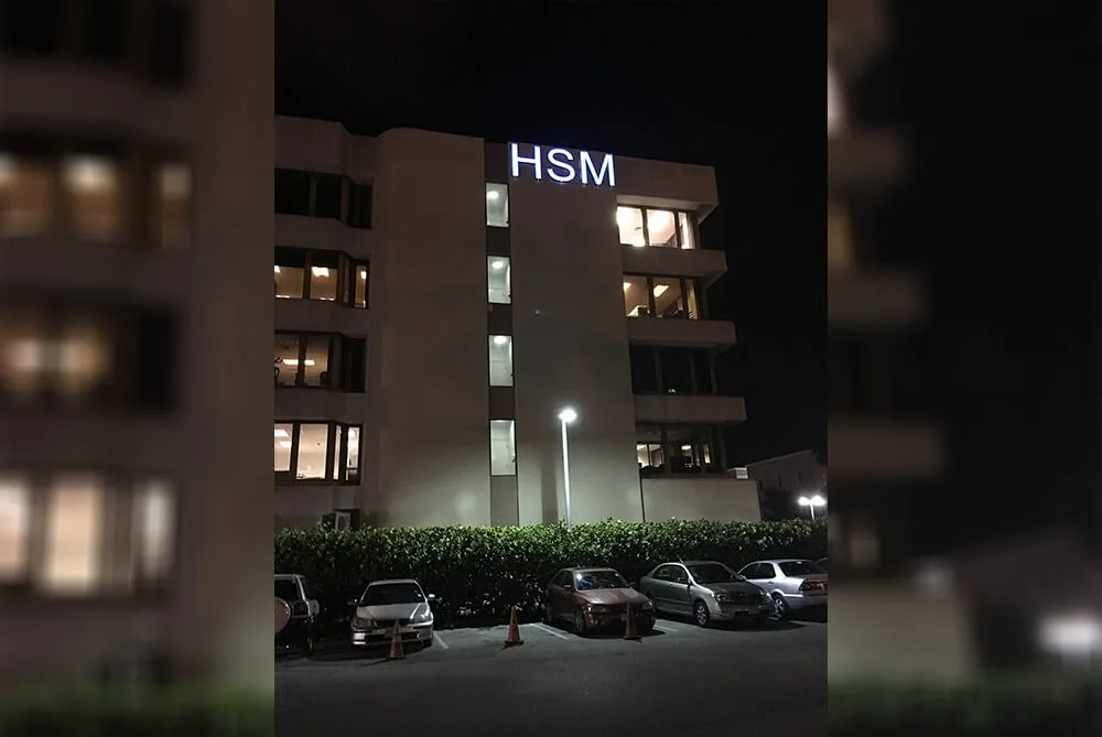 Front-lit and halo-lit combination channel letter signs